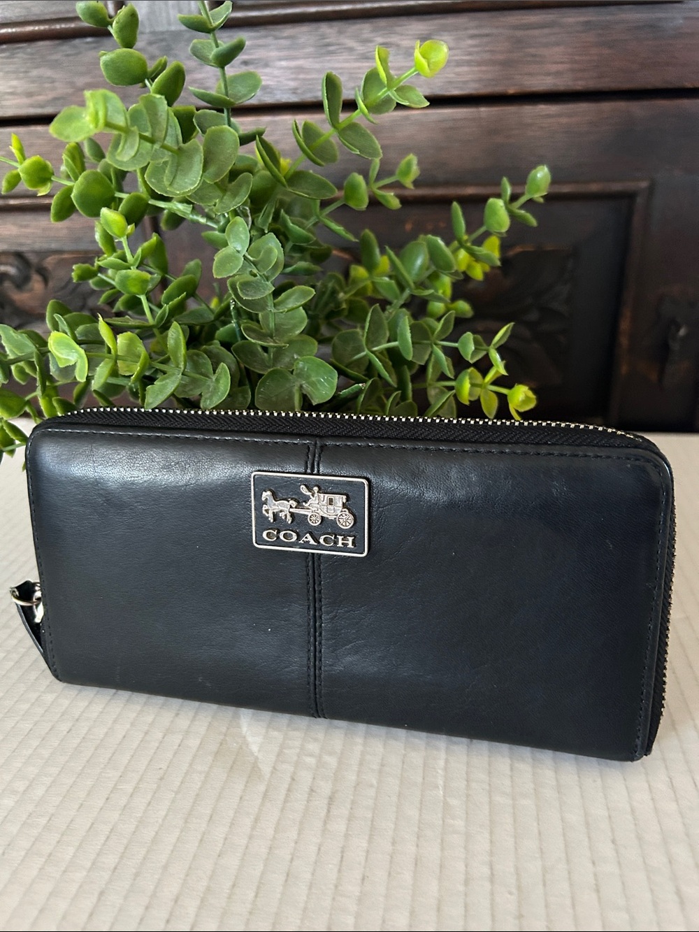 Coach Black Leather Zip Wallet with Silver Logo Plaque